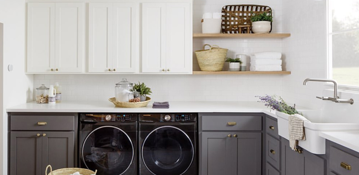 laundry room with black cabinets